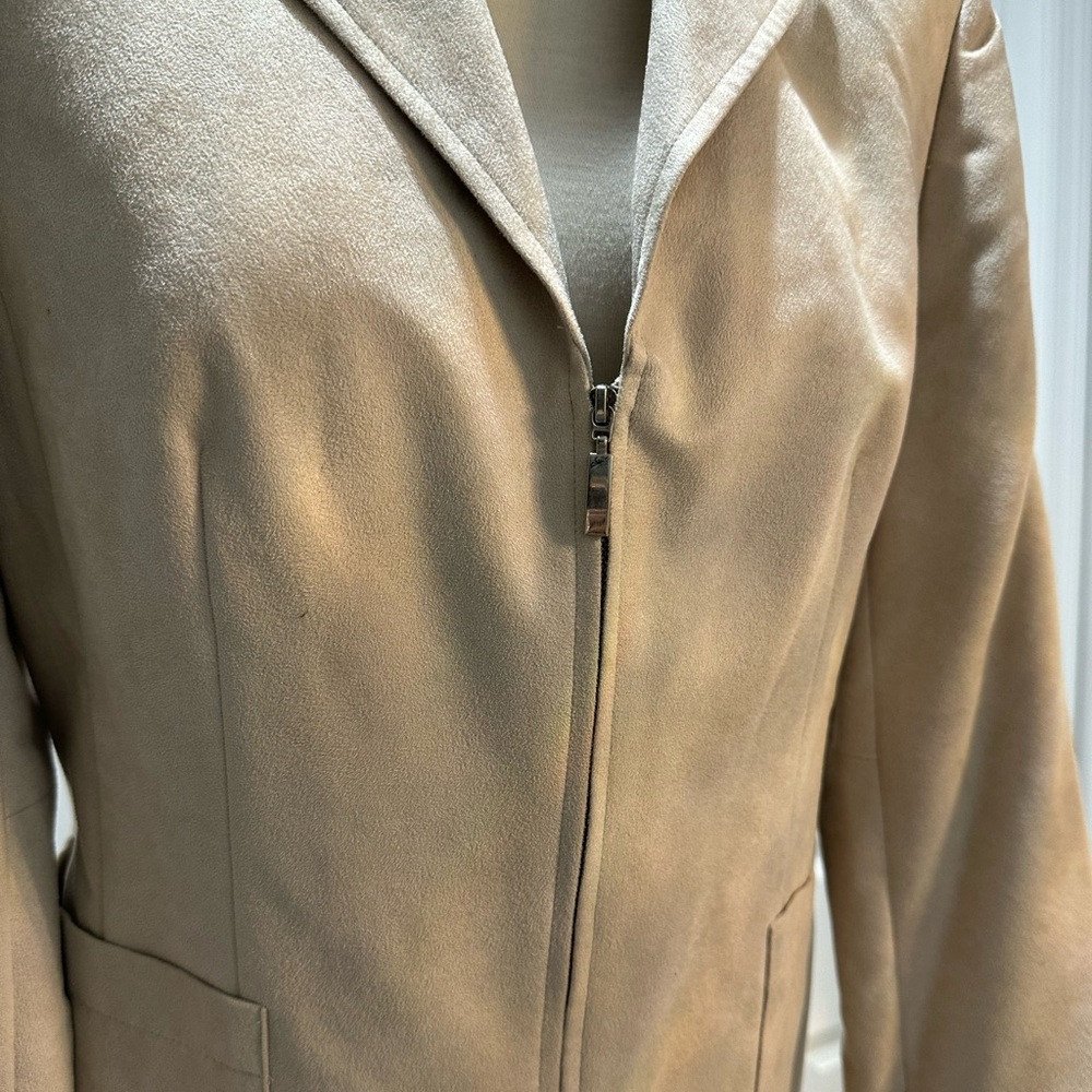 Cream color, suede jacket with 
Zipper instead of buttons